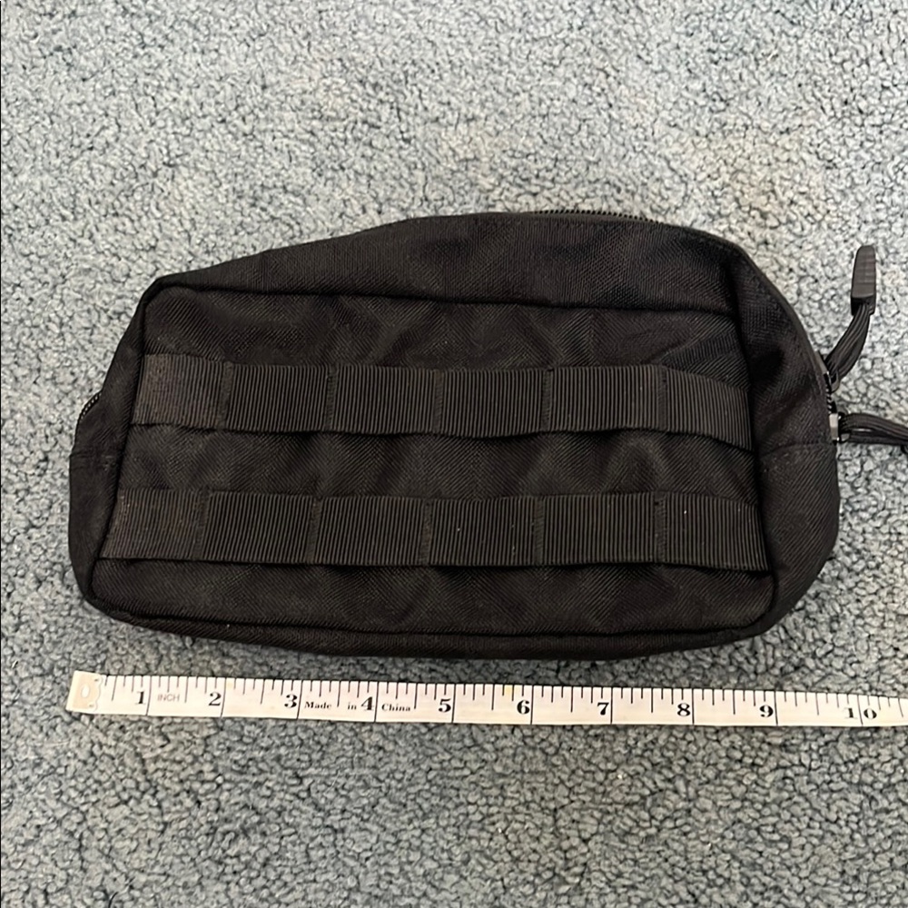 Black nylon bag with MOLLE Attachment Loops